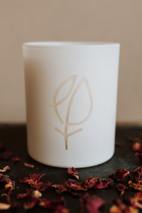 White candle glassware with etched EPT logo