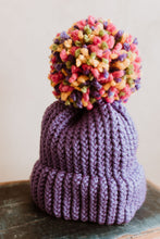 Hand-knitted purple bobble hat